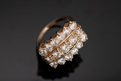 Yellow Gold Three Row Diamond Band. One ladies 14K yellow gold Diamond Ring with a split shank. The