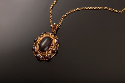 Yellow gold Garnet Pendant on Gold-filled Chain.  One ladies handmade 10K yellow gold Garnet