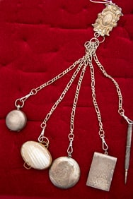Silver tone Chatelaine with "Sterling" marked Belt Clip with 5 drop chains that holds a mother of