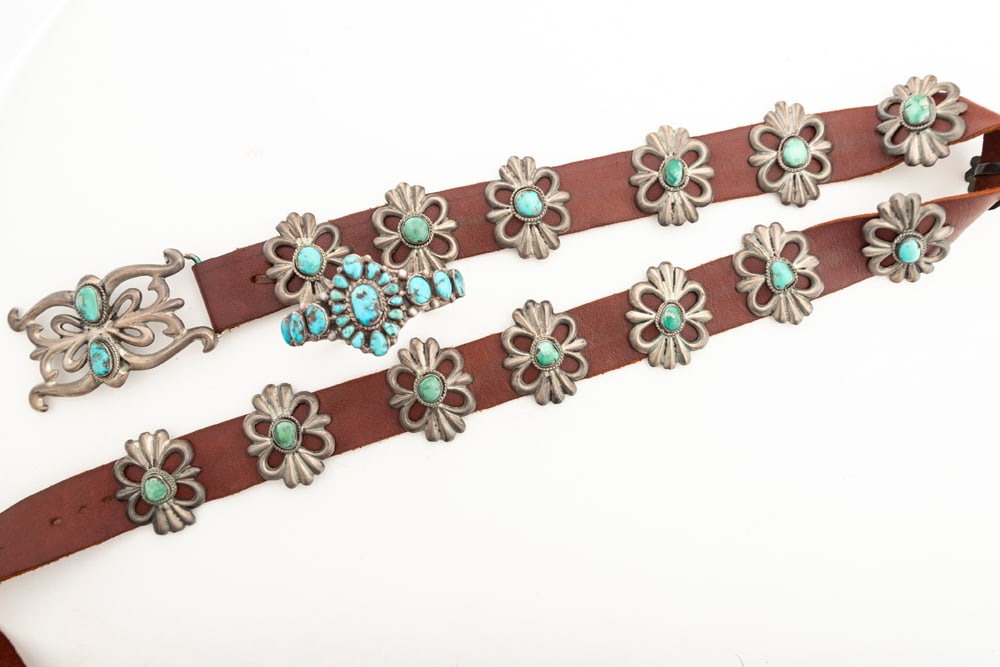 Vintage 15 piece sand cast silver & turquoise Concho Belt, 14 conchos with polished turquoise stones: Vintage 15 piece sand cast silver & turquoise Concho Belt, 14 conchos with polished turquoise stones in center. Sold with a silver and multi-stone Cuff. Belt measures 34-36" long.