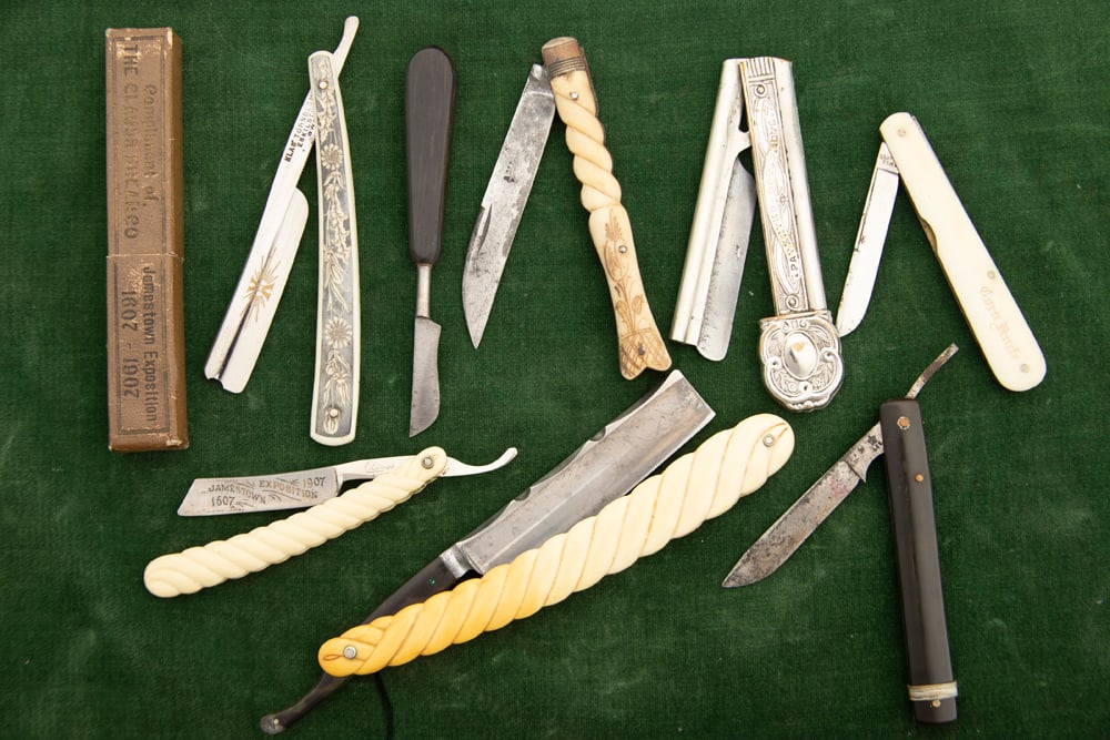 Collection of seven vintage miniature Straight Razors and one full size Straight Razor. Razor at far: Collection of seven vintage miniature Straight Razors and one full size Straight Razor. Razor at far left has its original box. Will be sold as a collection. MUCKERHEIDE ESTATE.