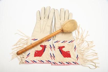 A pair of fringed Doe  Skin beaded Gauntlets with multi color beads and 4" fringe. NOTE: Gauntlets