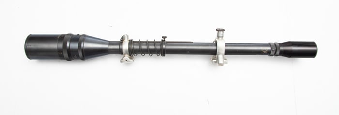 Long Range Scope marked "J. Unertl", SN 65074, measures 24" long, accompanied by lens covers and