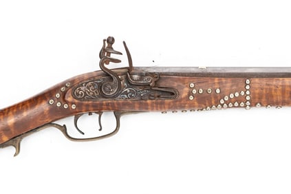 Antique Full Stock Flintlock Rifle, with curly maple stock and silver spotted tack decoration, has