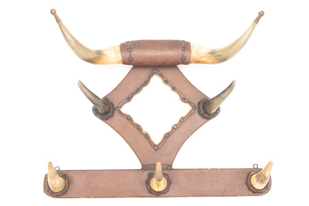 Bunk House Steer Horn, Spur and Hat Rack, constructed of 7 horns wrapped in buggy material,: Bunk House Steer Horn, Spur and Hat Rack, constructed of 7 horns wrapped in buggy material, scalloped mirror. Appears to be 100 % original. It has a 20" spread at top, 22" overall width x 16" T.