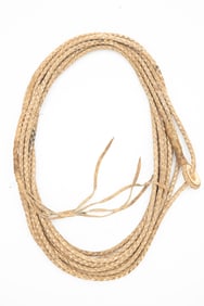 Vintage braided rawhide Reata, approximately 32 ft. long, with very unusual leather wrapped bone