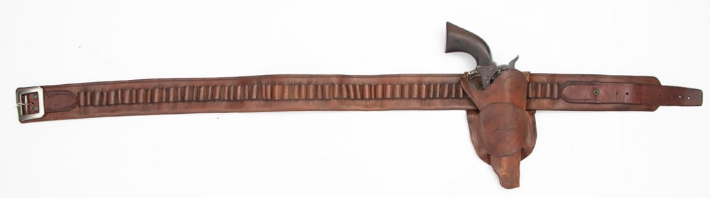"Oklahoma" marked Holster with unmarked Money Belt. The single loop holster is stamped "Marshall: "Oklahoma" marked Holster with unmarked Money Belt. The single loop holster is stamped "Marshall Stevens / Maker / Vinita OK." The skirt has been trimmed at the bottom. The toe of the holster also app