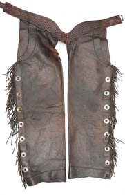 Pair of early leather fringed, step in, Shotgun Chaps with tooled basket weave border and 14