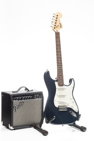 Fender Squierstrat, Electric Guitar in fitted hard case. Included is a Fender Frontman 15G