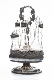 Beautiful silver and glass Cruet Set with six bottles, two with glass stoppers, revolving stand is