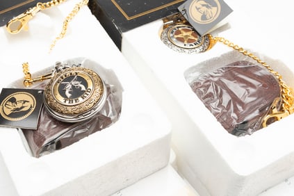 Pair of Collector Pocket Watches, new in box. One is marked "Billy the Kid", by Franklin Mint