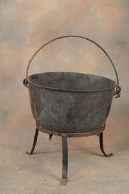 Large cast iron footed Wash Pot, measures 25 1/2" Dia x 16" D, with heavy rustic stand and original