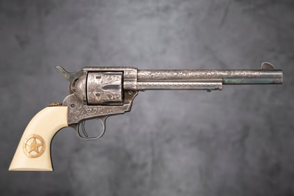Engraved Colt SAA Texas Ranger Commemorative Revolver, SN 67T*R, in original display case. This is