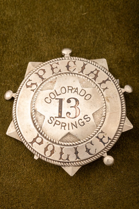 Old Circle Star Badge with ball tips marked “SPECIAL POLICE?? with “COLORADO 13 SPRINGS?? in: Old Circle Star Badge with ball tips marked “SPECIAL POLICE” with “COLORADO 13 SPRINGS” in center. Very unique design in near mint condition, missing one of the ball tips (taped to bac