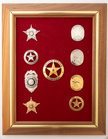 Framed Group of Nine (9) Badges of "Clint Peoples 50 Years A Lawman", which begins in 1930-1974.