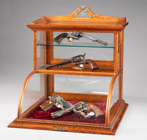 Very unique oak, curved glass, table top model Showcase with bronze label on front marked "J.W.