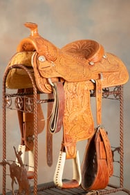 Extremely fine highly tooled Saddle marked "King, Waco, Tex." Saddle is in unused condition with 15"