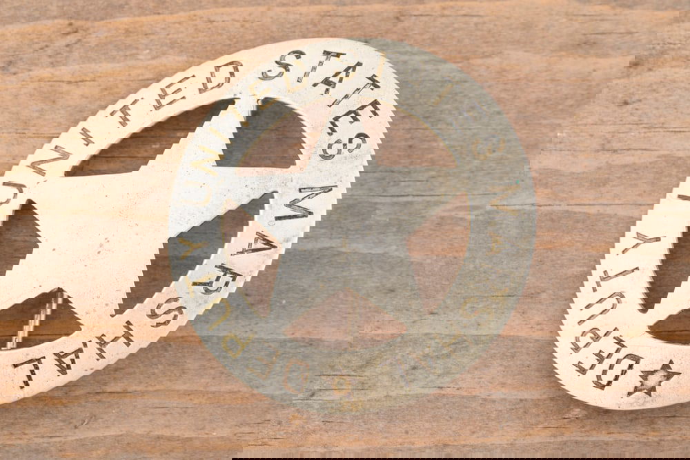 Silver colored vintage 5-point, cut-out Circle Star Badge marked “DEPUTY UNITED STATES MARSHAL??.: Silver colored vintage 5-point, cut-out Circle Star Badge marked “DEPUTY UNITED STATES MARSHAL”. Hallmarked “LAMB’S & S./ CO./WASH. D.C.”, measures 2 ¼” D. This is the i