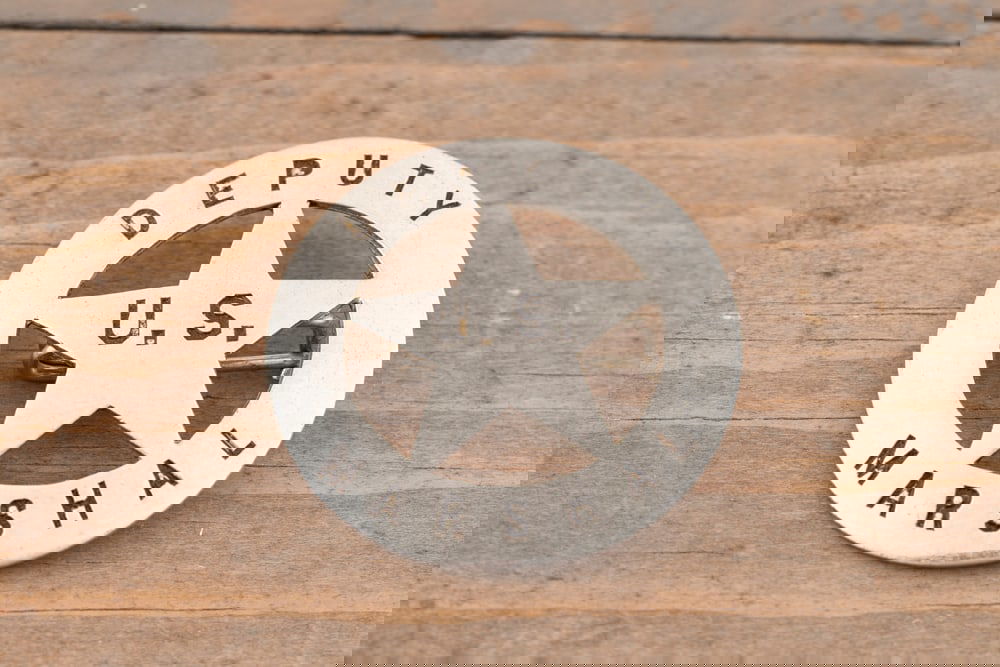 Vintage 5-point, cut-out Circle Star Badge marked “DEPUTY MARSHAL?? with “U.S.?? in center of: Vintage 5-point, cut-out Circle Star Badge marked “DEPUTY MARSHAL” with “U.S.” in center of Star. Badge has good plating and black enamel, pin and catch are in place, measures 1 5/8&rd