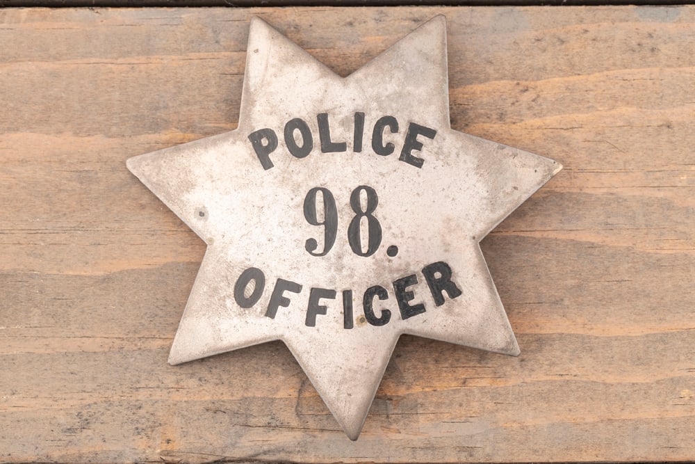 Large vintage 7-point Star Badge marked “POLICE 98 OFFICER??, possibly sterling silver with black: Large vintage 7-point Star Badge marked “POLICE 98 OFFICER”, possibly sterling silver with black enamel lettering, measures 3 3/8” T x 3 3/8” W, has old “T” pin and “C&rd
