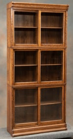 Three stack quarter sawn oak Danner (1823-1918), sliding glass door Bookcase, circa 1915, measures