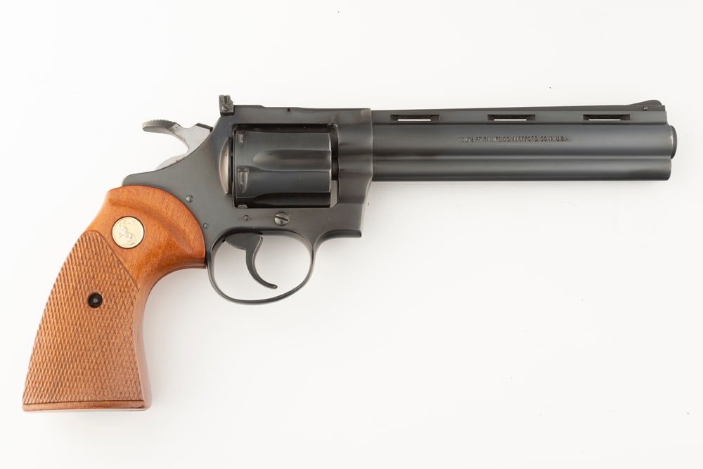 Colt Diamond Back Double Action Revolver, .22 LR caliber, SN S81495, blue finish, 6" barrel, like: Colt Diamond Back Double Action Revolver, .22 LR caliber, SN S81495, blue finish, 6" barrel, like new condition, original Colt checkered grips, sold in canvas carry bag. (MODERN)