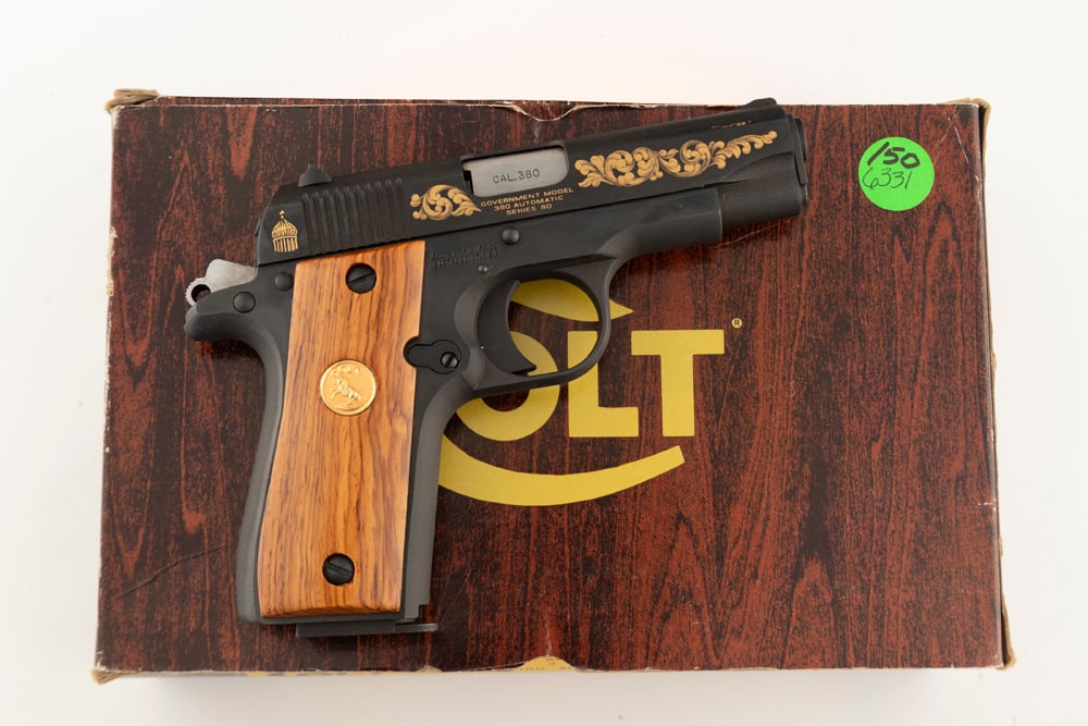 Colt MK IV, First Edition, Semi-Auto Pistol, .380 caliber, SN RC00548, blue finish, 3 1/4" barrel,: Colt MK IV, First Edition, Semi-Auto Pistol, .380 caliber, SN RC00548, blue finish, 3 1/4" barrel, with fancy gold on slide. Sold as new condition in original serial numbered box. (MODERN) The Late Jo