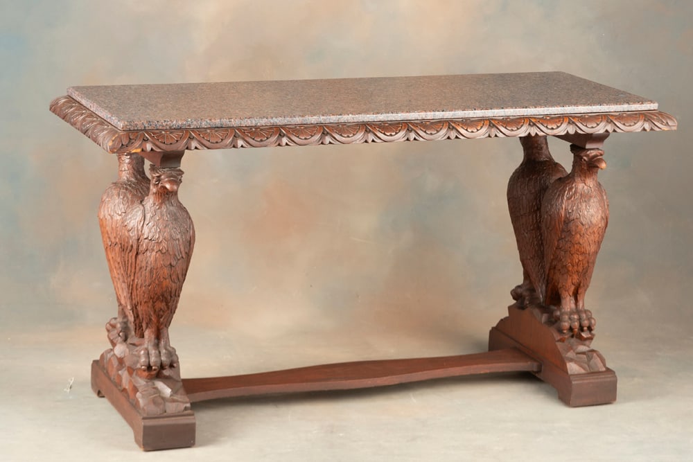 Antique highly carved mahogany Sofa/Wall Table, circa 1900, with four (4) massive carved eagles: Antique highly carved mahogany Sofa/Wall Table, circa 1900, with four (4) massive carved eagles supporting top. Top has floral carved edge with removable polished marble top, and shaped stretcher base