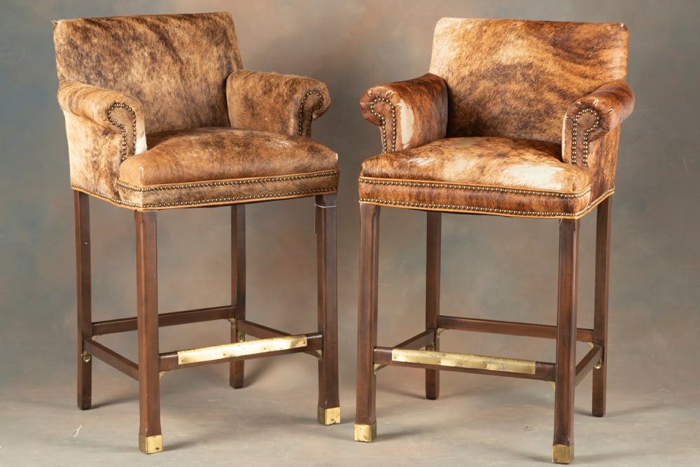 Matched pair of high seat Game Chairs with arms, covered with brindle cow hide and spotted border,: Matched pair of high seat Game Chairs with arms, covered with brindle cow hide and spotted border, 41 1/2" T at back and 31" high at seat. Show use but in very good condition. Will sell as a pair. The