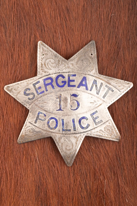 Vintage 7-point Star Badge marked “SERGEANT/ 15/ POLICE??, two holes at the top of badge, looks: insert text