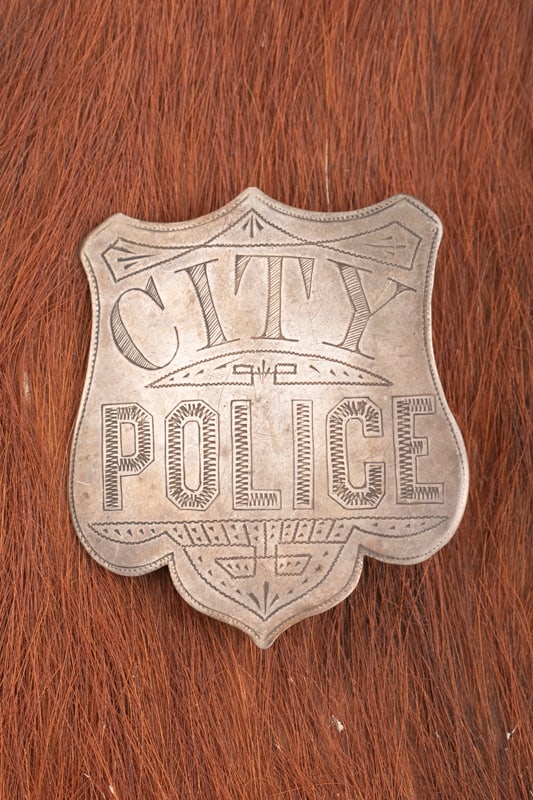 Hand engraved vintage Shield Badge marked “CITY POLICE?? with nice detailing. Although no: Hand engraved vintage Shield Badge marked “CITY POLICE” with nice detailing. Although no markings are visible on this old badge it could be Sterling Silver, has pin and catch in place, measure