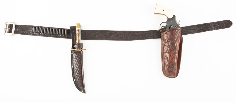 Vintage "S.D Myres, El Paso, Tex" marked, tooled Cartridge Belt, accompanied by a two tone floral: Vintage "S.D Myres, El Paso, Tex" marked, tooled Cartridge Belt, accompanied by a two tone floral tooled Holster for a 4 1/2" - 5" revolver. Also included is a beautiful clip point, stag handle Side K