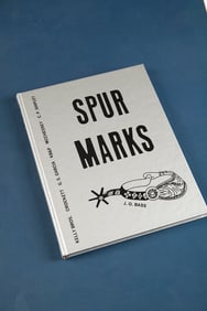 Book titled "SPUR MARKS", #277/500. This is a book greatly sought after by all Bit & Spur