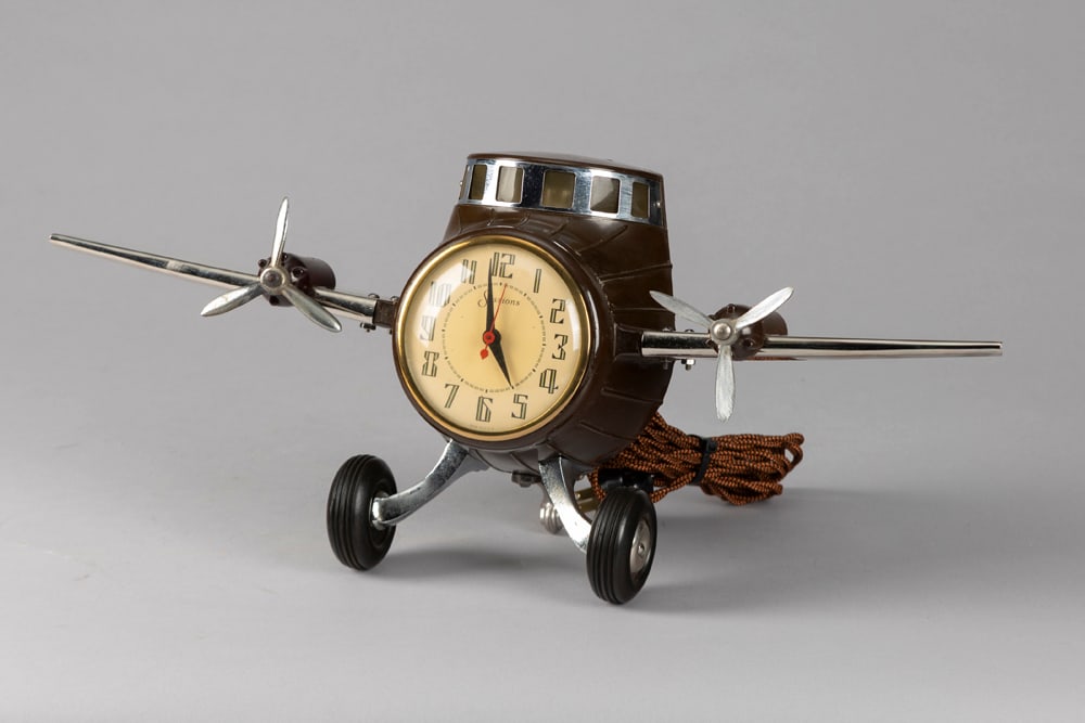 Unique Airplane Clock by Sessions Clock Company, circa 1930s, in immaculate condition for its age.: Unique Airplane Clock by Sessions Clock Company, circa 1930s, in immaculate condition for its age. Wing span is 20 1/2" L x 9" T. Clock is in running order with back lit top. As always estate found cl