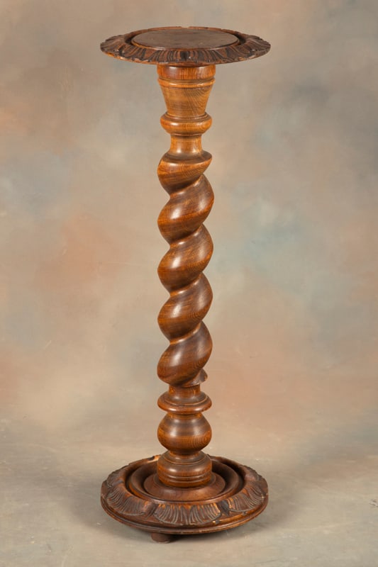 Carved antique oak Pedestal, circa 1900-1910, measures 39" T x 14" dia. carved base and matching: Carved antique oak Pedestal, circa 1900-1910, measures 39" T x 14" dia. carved base and matching carved top. Original finish, very good condition. The Late C.W. & Marie Lyle Estate.