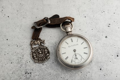 Antique open face silver man's Pocket Watch, manufactured by Elgin National Watch Co., in running