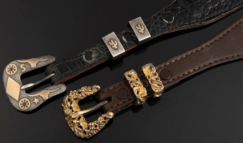 Two Western Ranger Dress Belts. (1) A black alligator, with sterling marked buckle and keepers with