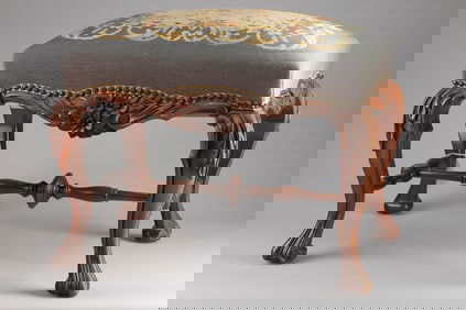 Fine quality antique floral carved Ottoman, circa 1920s, fine craftsmanship and needlepoint cushion