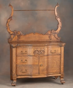 Beautiful American antique, quarter sawn oak, Serpentine Washstand, with claw foot base, circa 1900,