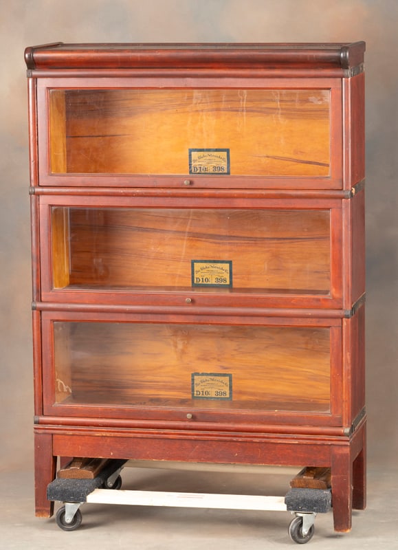 Antique three stack mahogany Lawyers Bookcase made by Globe-Wernicke Co., original finish, nice: Antique three stack mahogany Lawyers Bookcase made by Globe-Wernicke Co., original finish, nice overall condition. Bookcase measures 50" T x 34" W x 11 1/2" D. Factory designed to come in 5 separate p