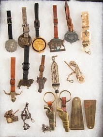 Framed Collection of 17 Items to include 10 Advertising Watch Fobs, 3 Watch Chains with fobs, 2