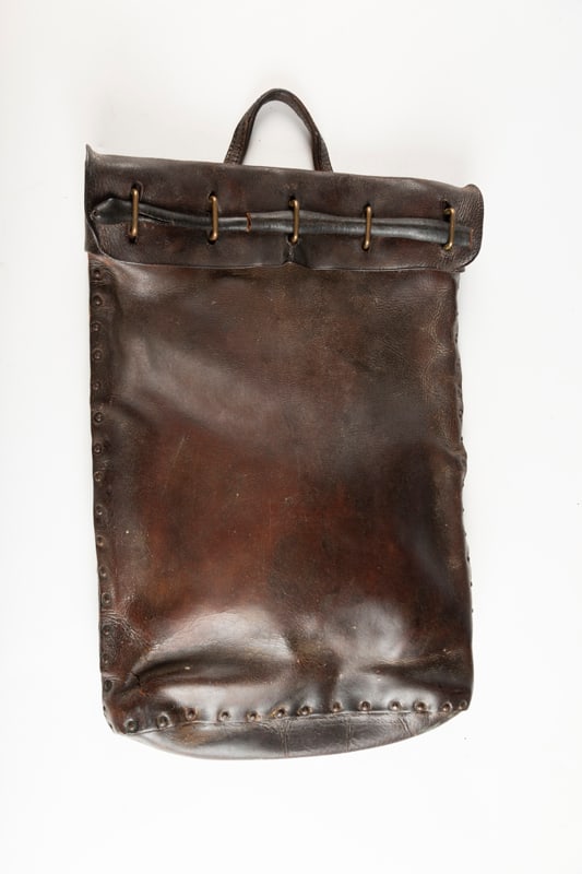 Very desirable antique, heavy leather Carry Bag, the type used by Wells Fargo and other shipping: Very desirable antique, heavy leather Carry Bag, the type used by Wells Fargo and other shipping companies. Measures 20" T x 14 1/2" across with leather flap supported by heavy brass rings and heavy d