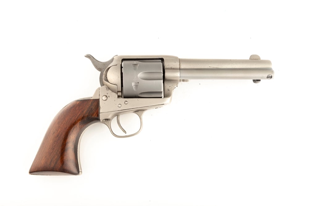 Antique Colt SAA Revolver, .44/40 caliber, SN 57490, manufactured circa 1880, serial number can be: Antique Colt SAA Revolver, .44/40 caliber, SN 57490, manufactured circa 1880, serial number can be found on frame and trigger guard. This revolver has been completely buffed showing no barrel address 