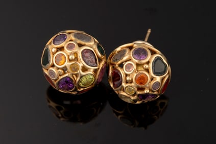 Ladies 14kt yellow gold omega clip earrings containing semi-precious gemstones weighing 10.6 gr.