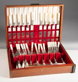 Partial set of 45 pieces of mismatched "Sterling" marked Flatware with mother of pearl handles.