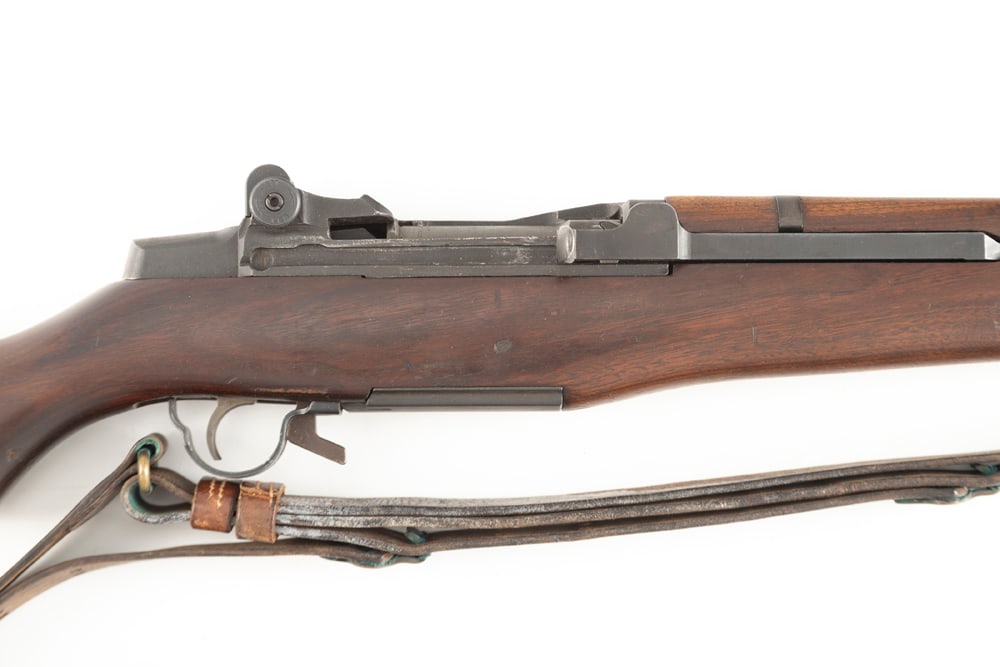 U.S. M1 Garand Rifle, scarce Winchester Manufacture, .30/06 caliber, SN 2312448. There are no: U.S. M1 Garand Rifle, scarce Winchester Manufacture, .30/06 caliber, SN 2312448. There are no visible re-build markings, the barrel action is uniformly pitted from hard use and phosphate finished afte