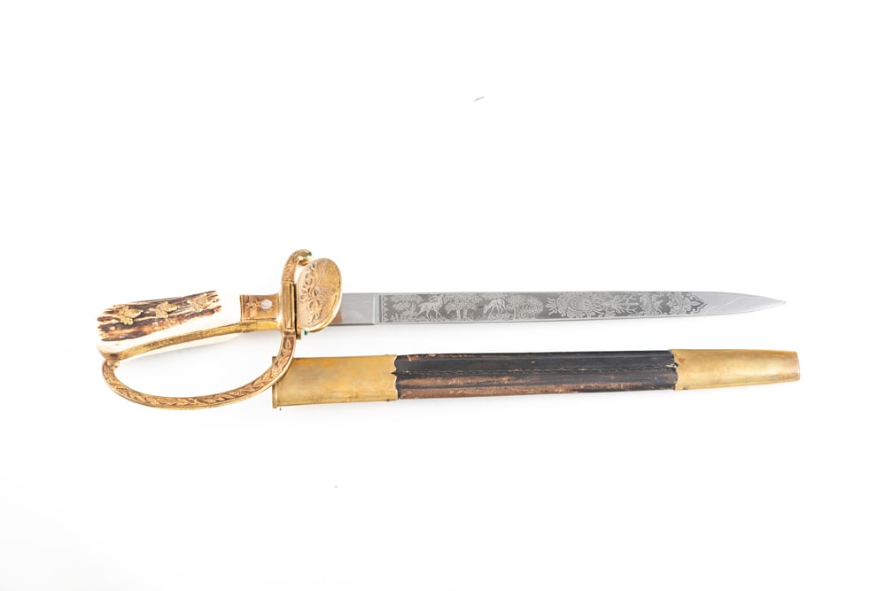 Amazing National Socialist Era Forestry Cutlass. Made by F.W. Hoeller. Excellent overall with etched: Amazing National Socialist Era Forestry Cutlass. Made by F.W. Hoeller. Excellent overall with etched blade showing deer, hound and fox motifs. Blade has not been sharpened and shows just light scratch