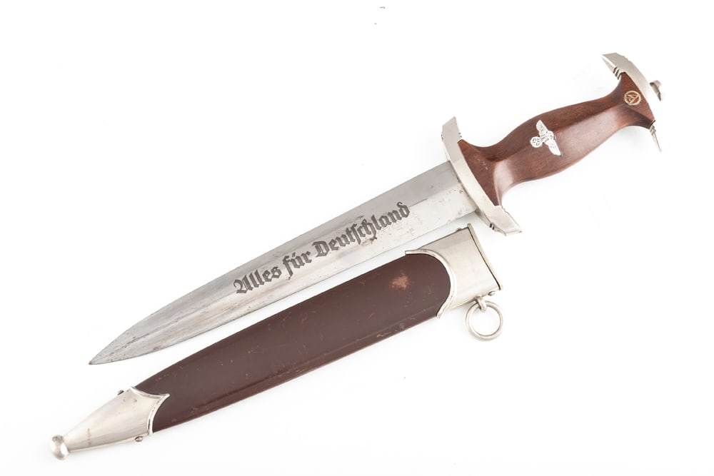 Original SA “Brown Shirt?? Dagger. Blade is etched with the slogan “Alles fur Deutschland: Original SA “Brown Shirt” Dagger. Blade is etched with the slogan “Alles fur Deutschland” and marked "RZM M7/49". The blade is overall in very good condition, showing light sharpening