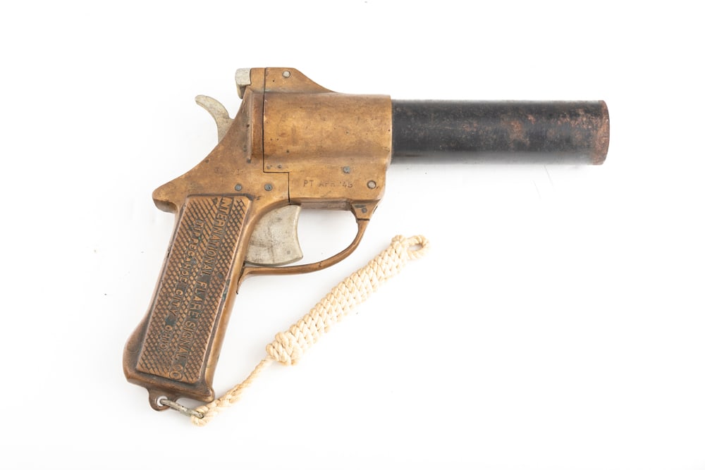 U.S. Issue WWII brass framed Flare Gun made by International Flare Signal Co., Tippecanoe, Ohio, 37: U.S. Issue WWII brass framed Flare Gun made by International Flare Signal Co., Tippecanoe, Ohio, 37 mm. These were primarily heavy and made for U.S. Aircraft. Breech loader with 8" steel barrel. These