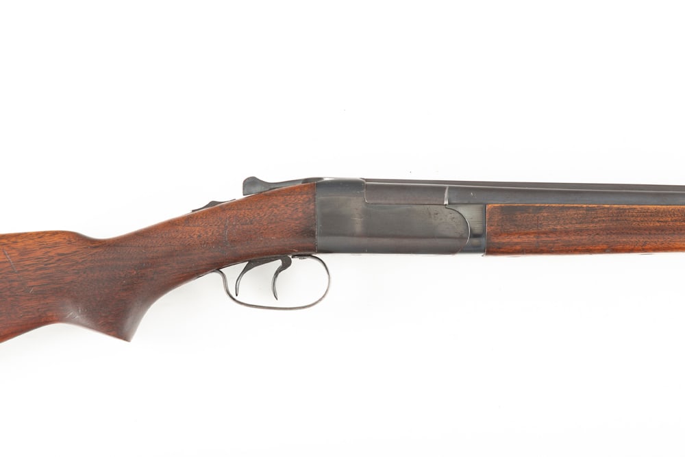 Winchester, Model 24, SxS Shotgun, .20 gauge, SN 98501, blue finish, 28" barrels, overall good: Winchester, Model 24, SxS Shotgun, .20 gauge, SN 98501, blue finish, 28" barrels, overall good condition, retains much of its original blue finish on its receiver, walnut stock and forend, 14" trigger
